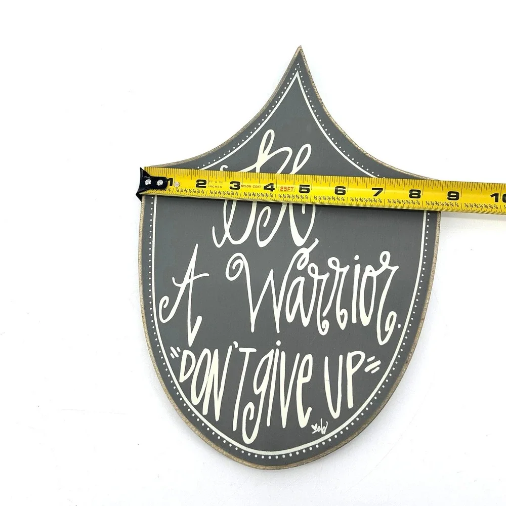 Be A Warrior Don't Give Up Shield Shaped Wooden Wall Plaque Gray White Boy Decor